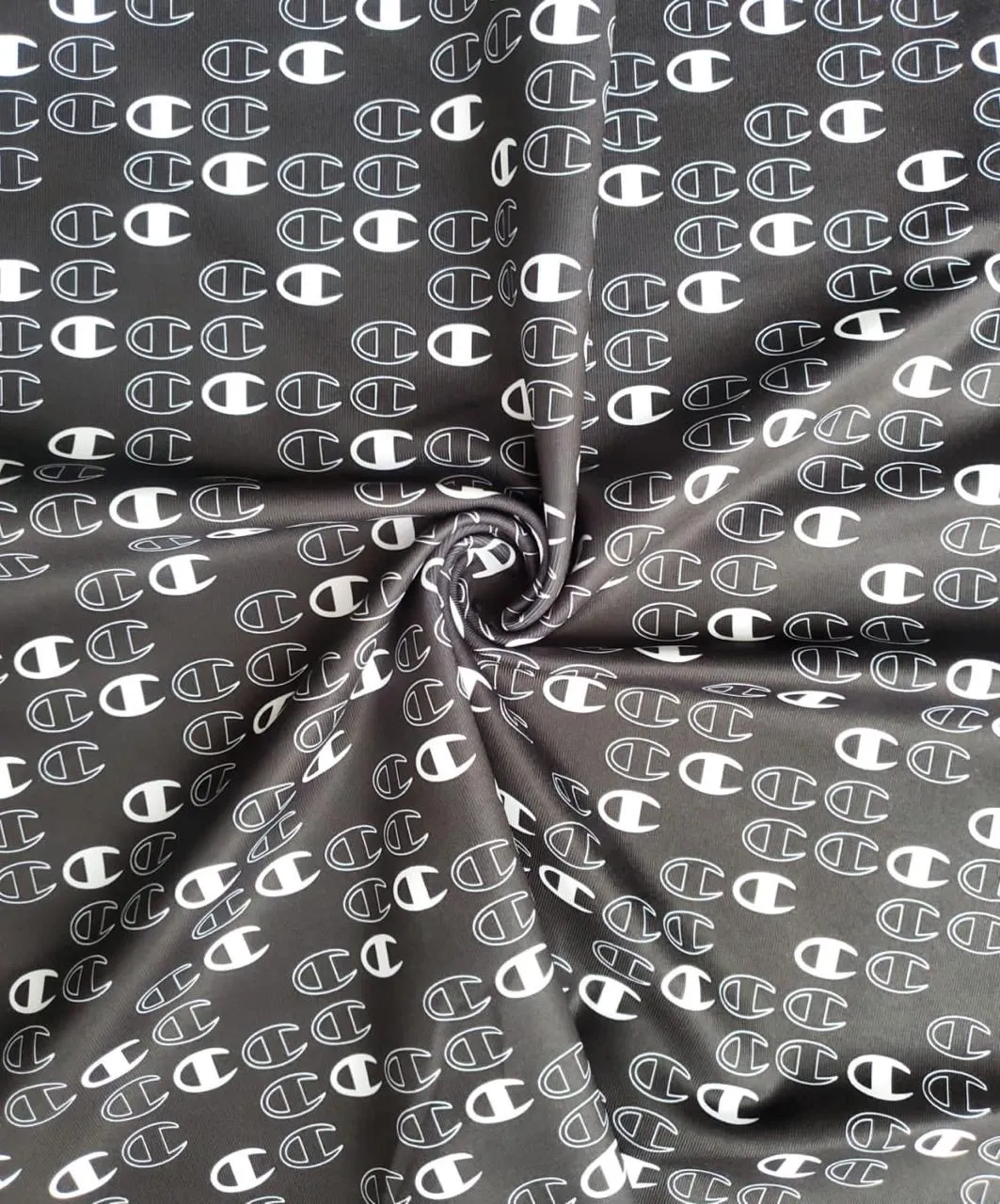 Gris Logos Blancos — Licra Estampada Aquerontex, Heredia Costa Rica